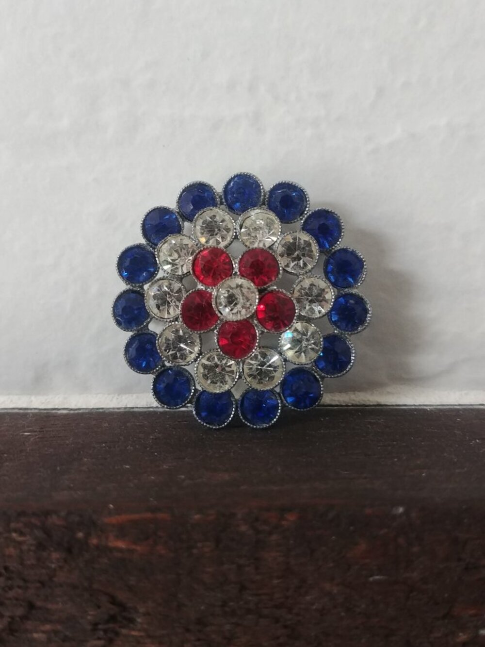 Vintage red blue and clear crystal flower round brooch pin